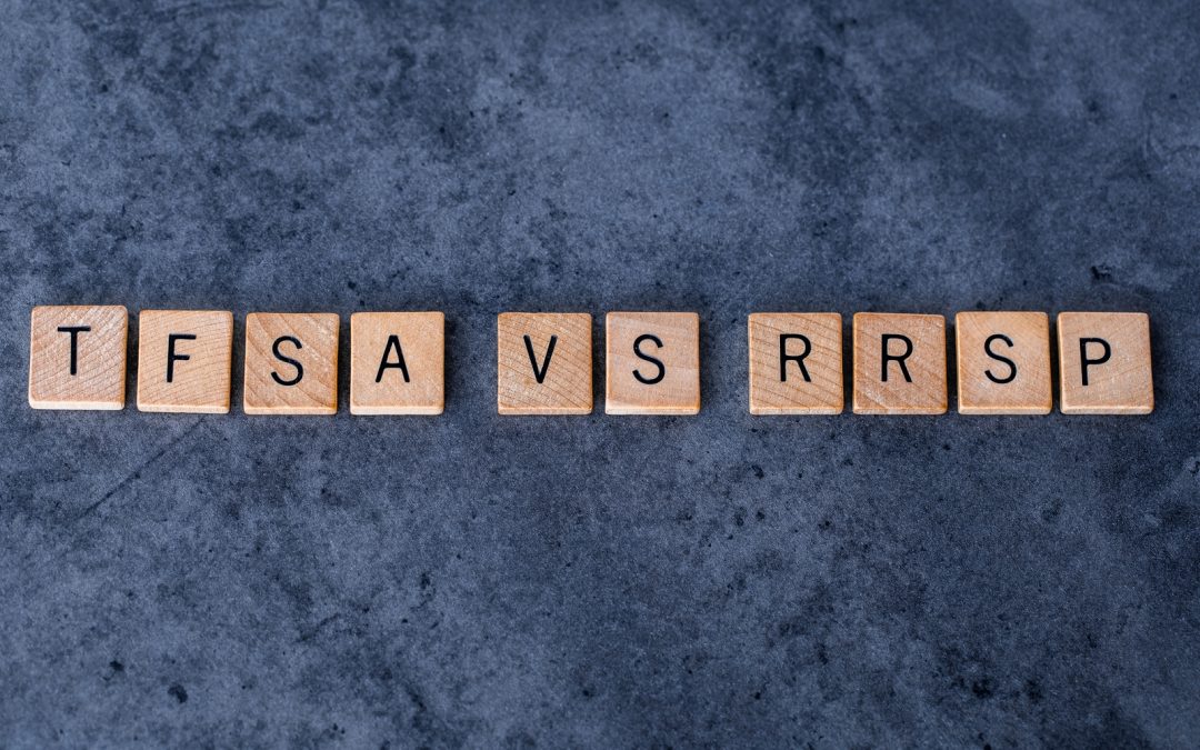 "TFSA vs RRSP" spelled out in wooden letter tiles on a dark blue and black background