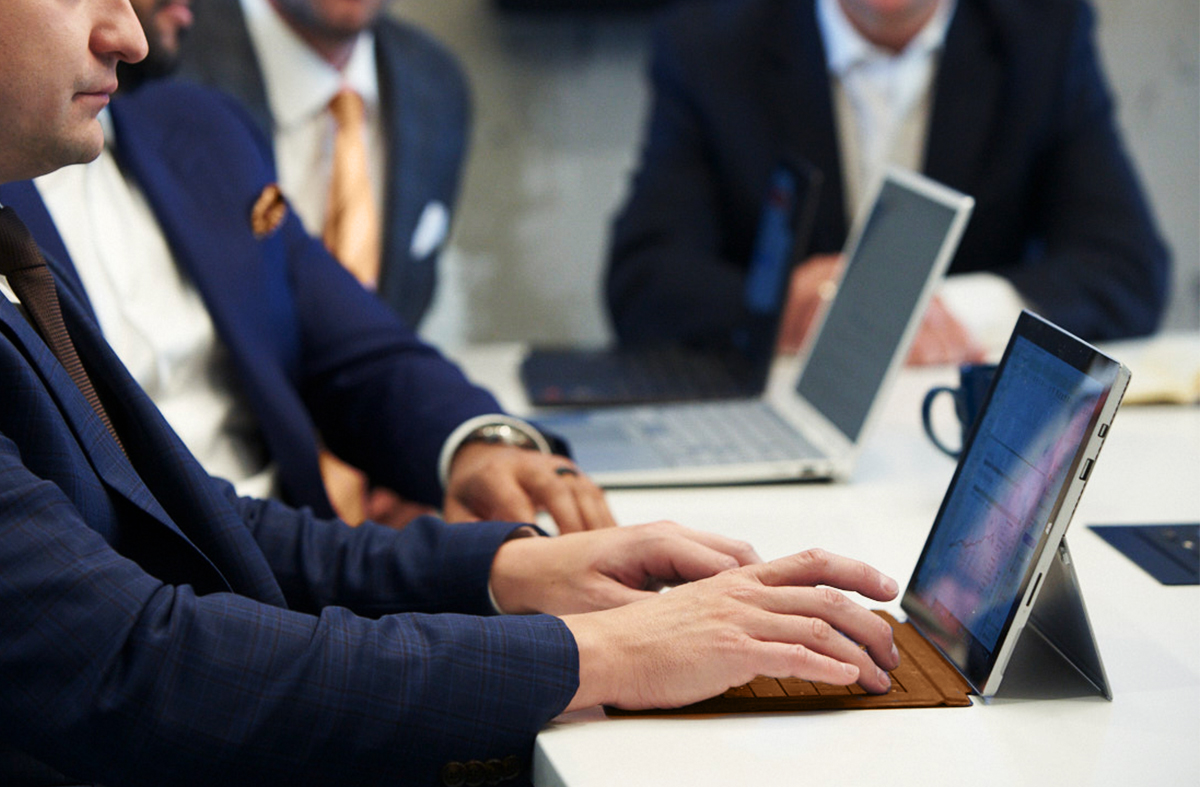 Qopia financial team reviewing market performance