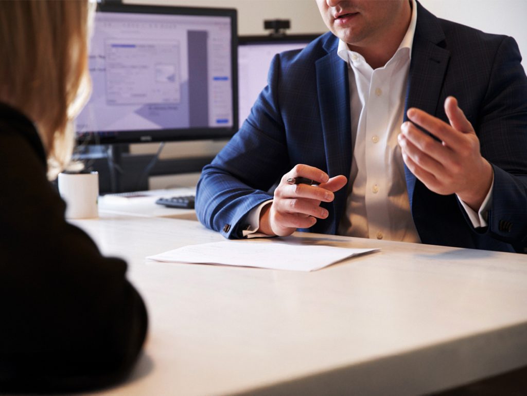 client discussing their portfolio with ben from qopia