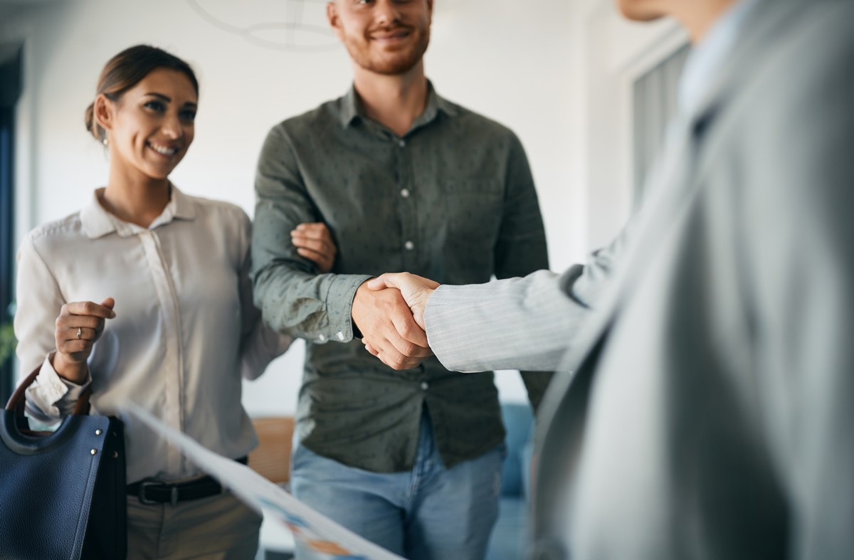 couple meeting with a new advisor