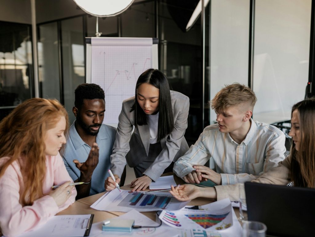 happy team at work brainstorming an ideas for business