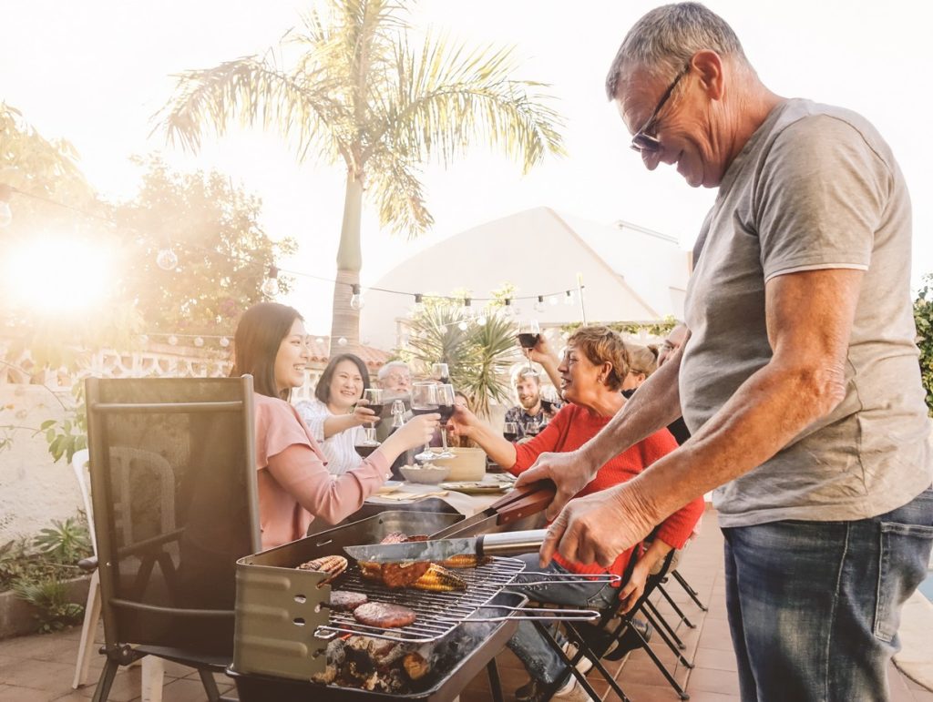 family having a barbeque on a nice warm summer day