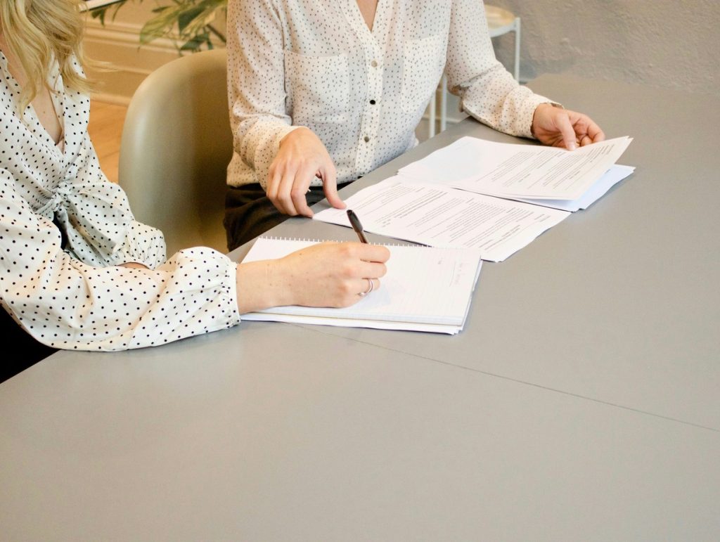 Business owner doing a plan audit on benefits after bill 11